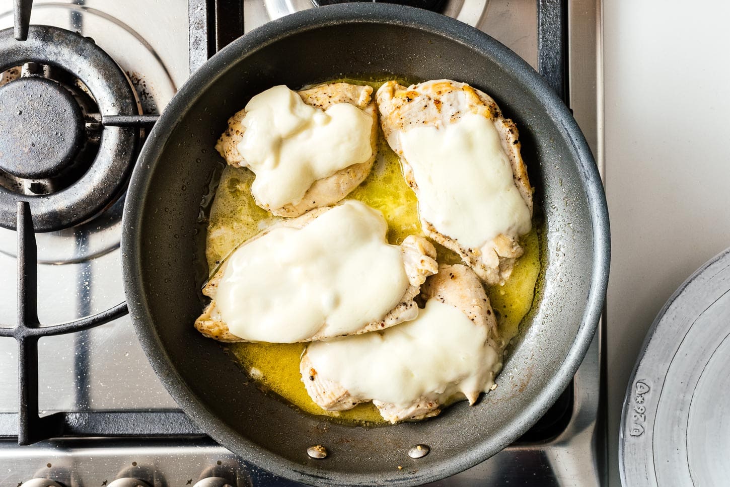 melting cheese on chicken | sharefavoritefood.com